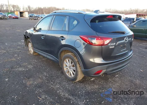 2015 Mazda Cx-5 Touring z USA, uszkodzony, nr VIN JM3KE2CY9F0489621